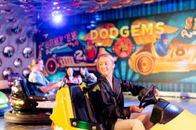 Girl playing dodgems at Archie Brothers Karrinyup