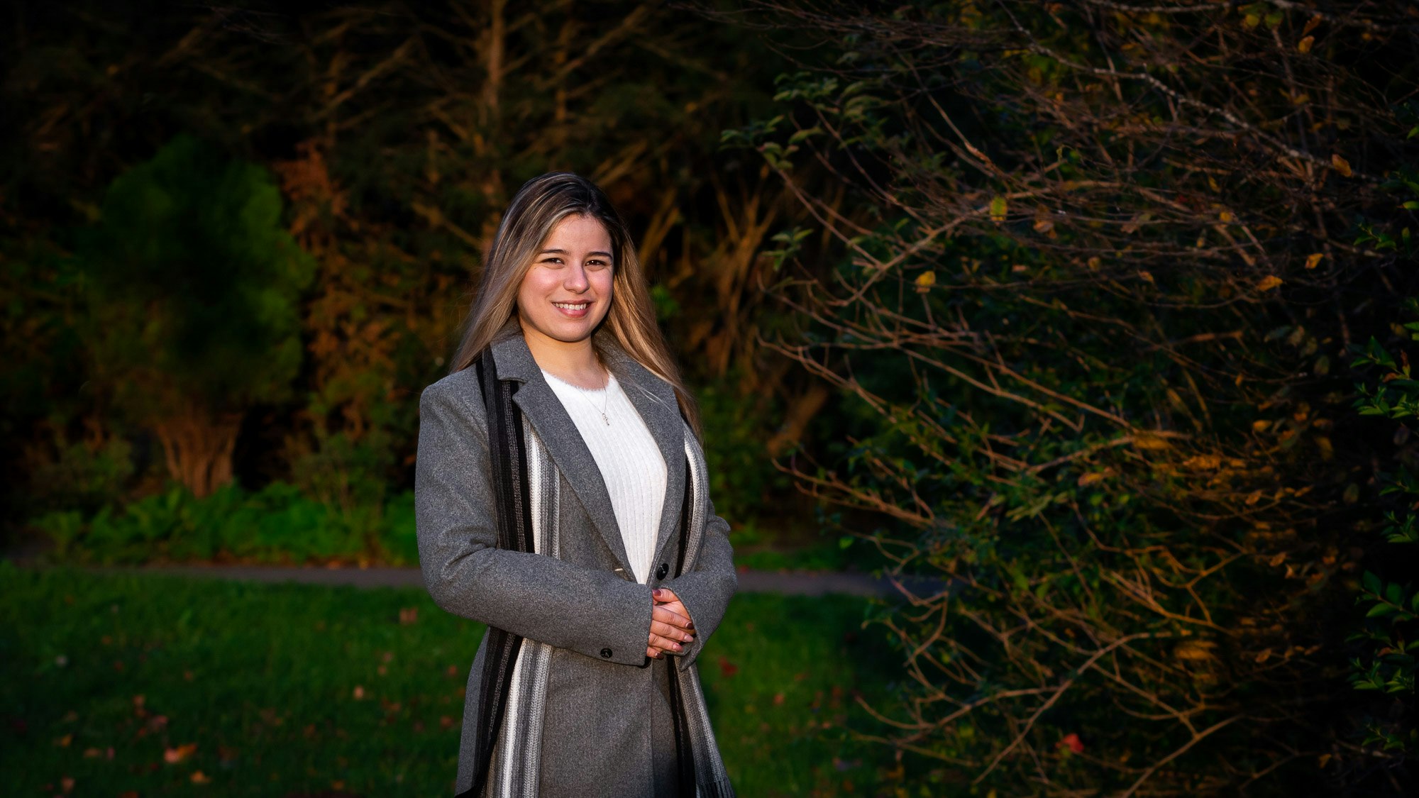 Profile photo of Lisandra in a grey coat