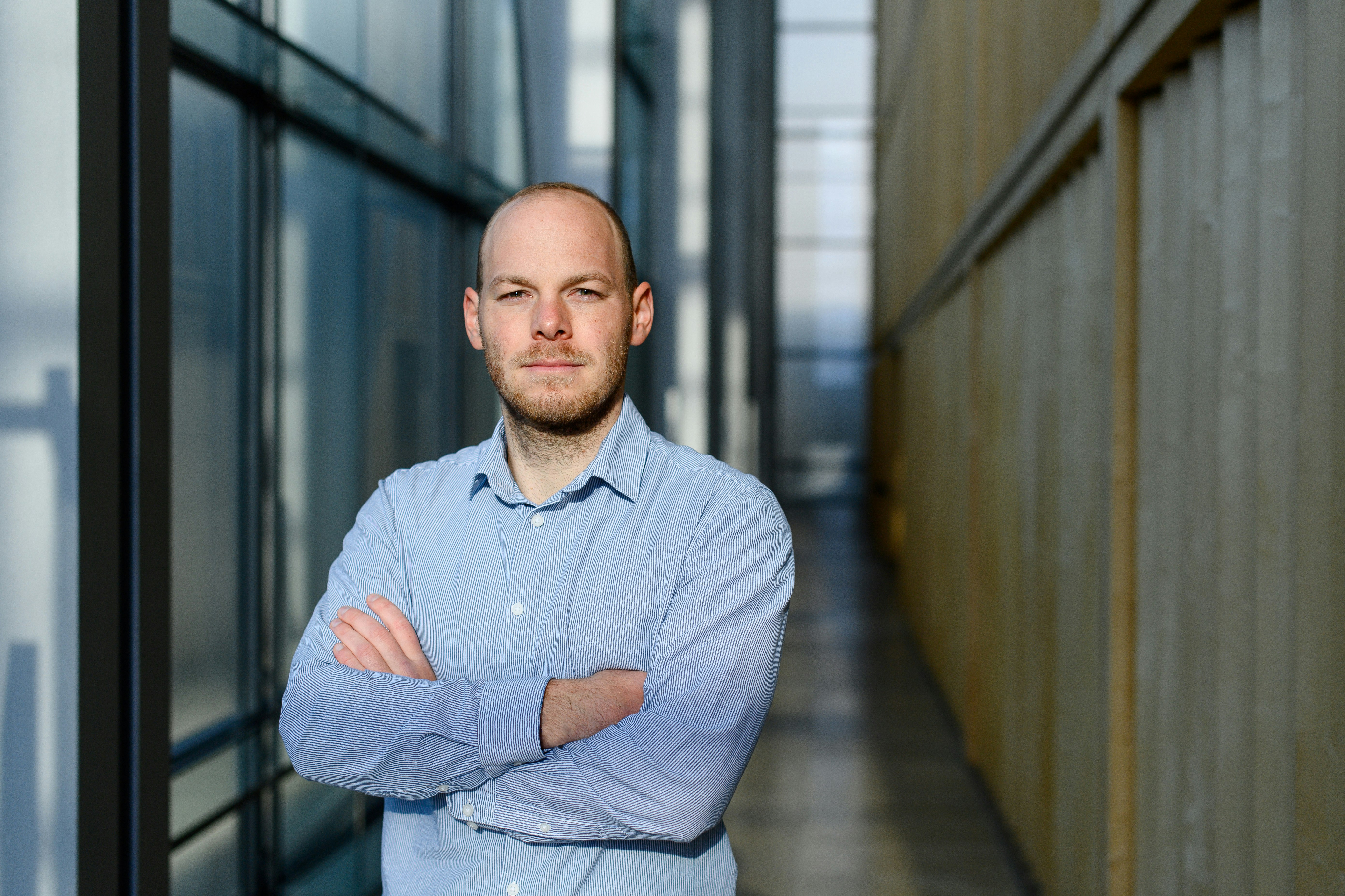 Man in a bright blue shirt.