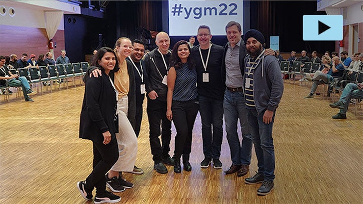 The whole team arm in arm on the Yearly Group Meeting.