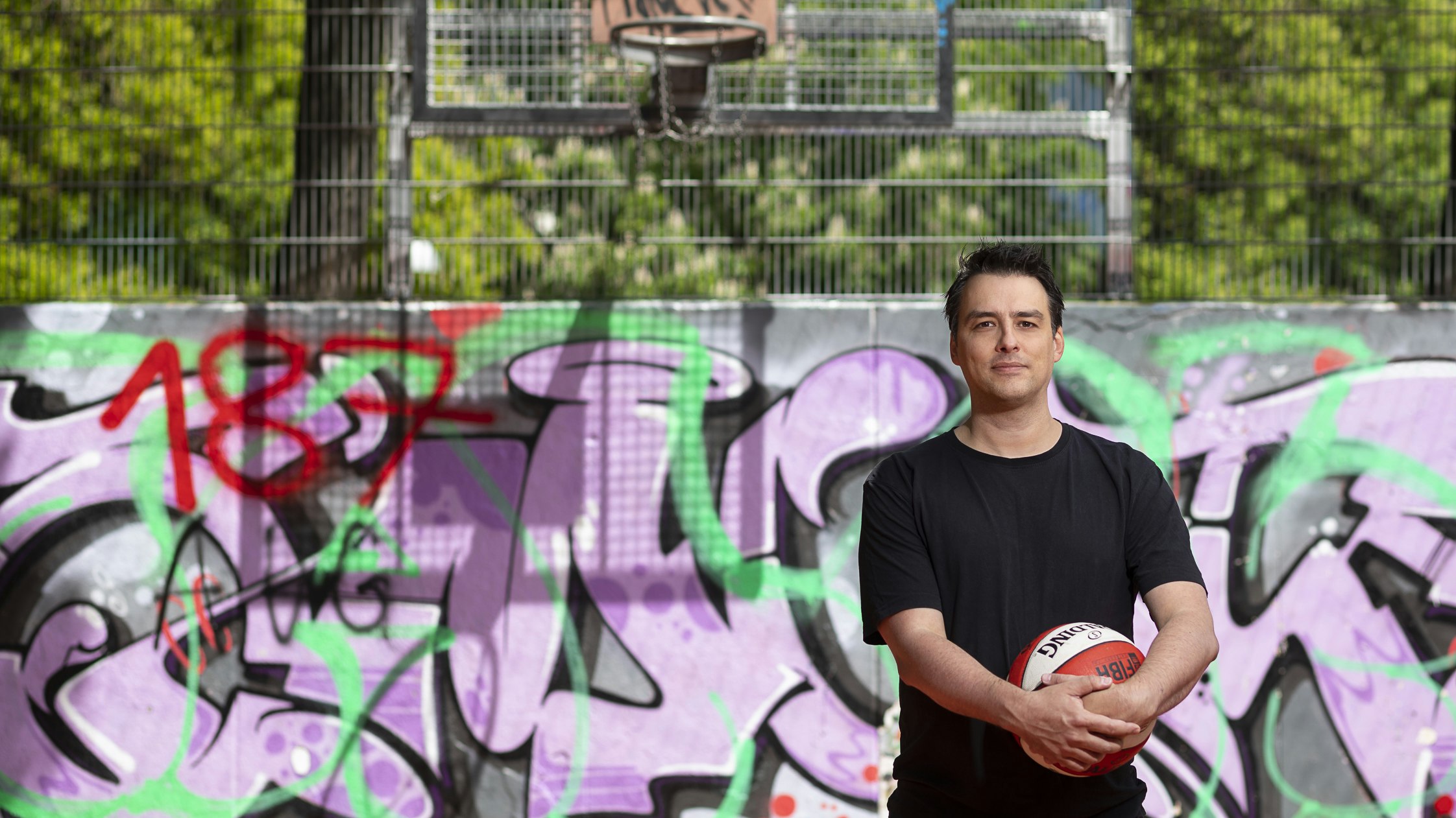 Person holding a basketball