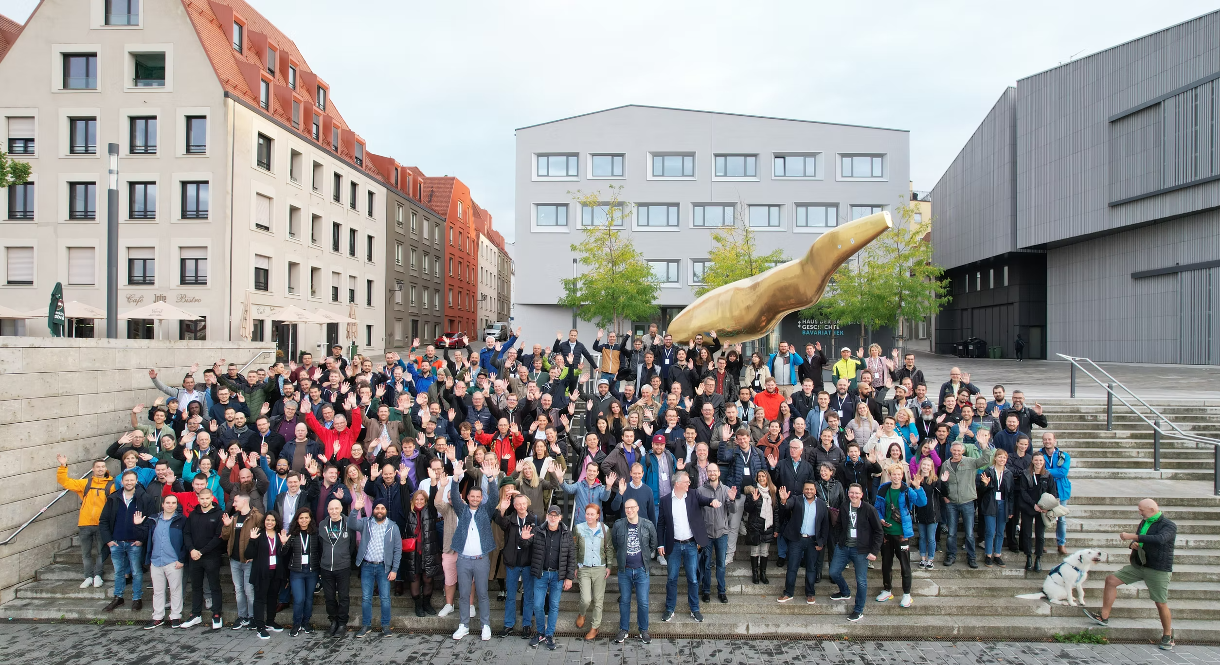 Participants of the Yearly Group Meeting standing on a staircase in Regensburg