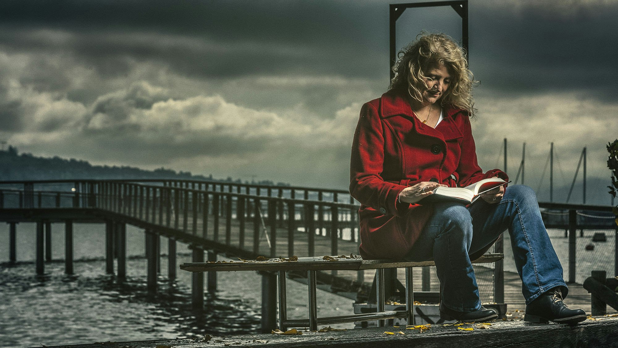 Denisa, reading a Book on lakeside