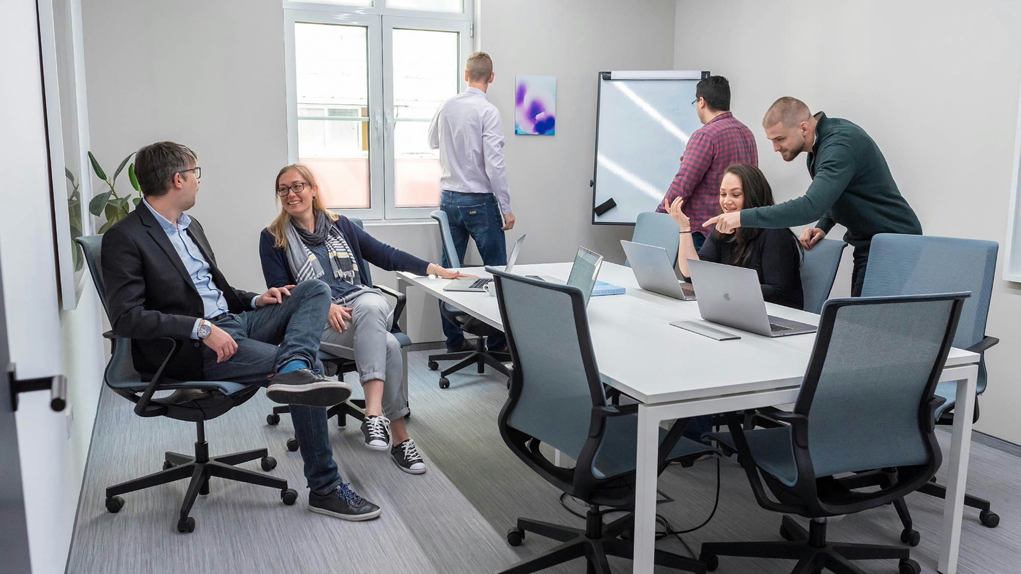 People in conference room.