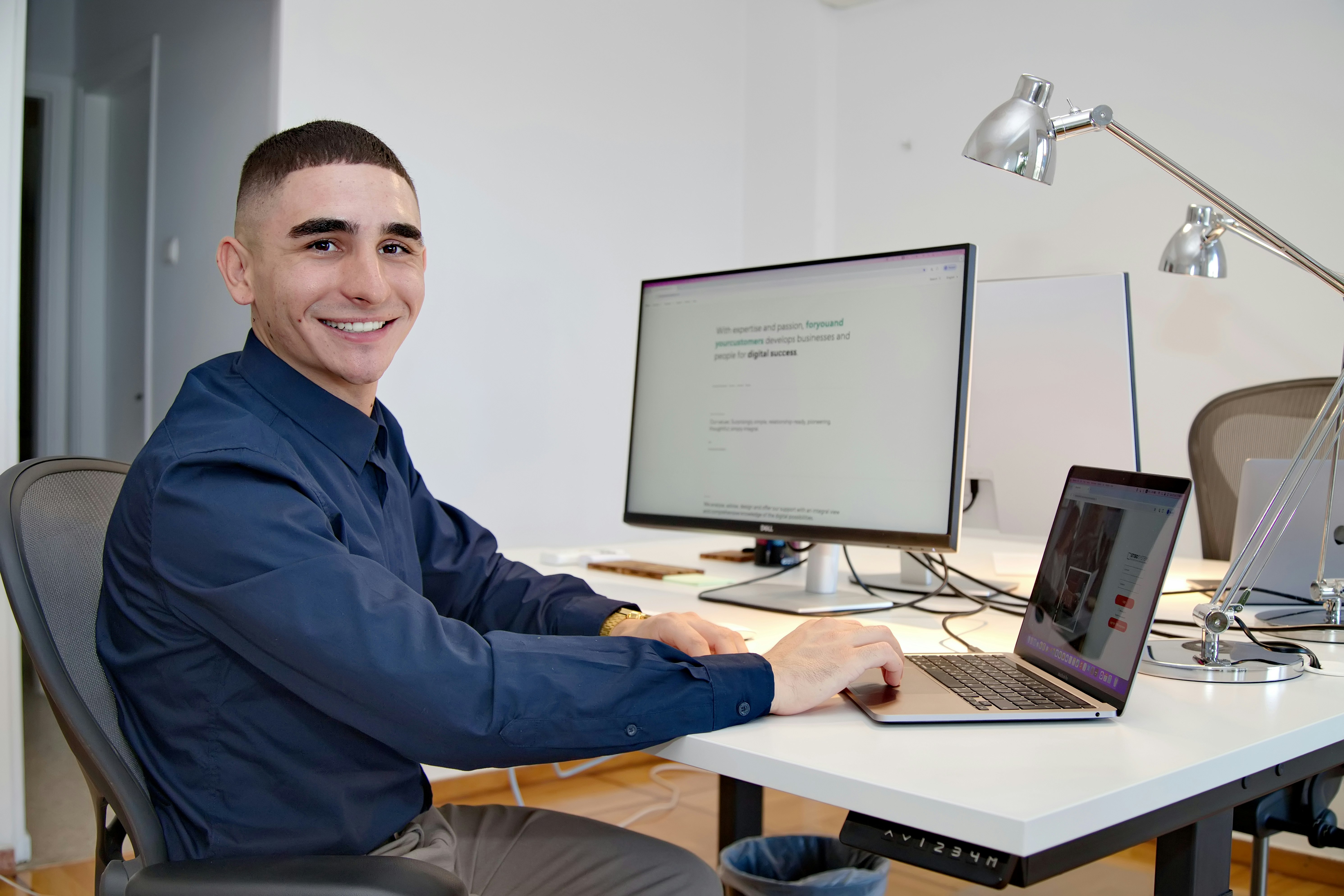 Claudio at his desk