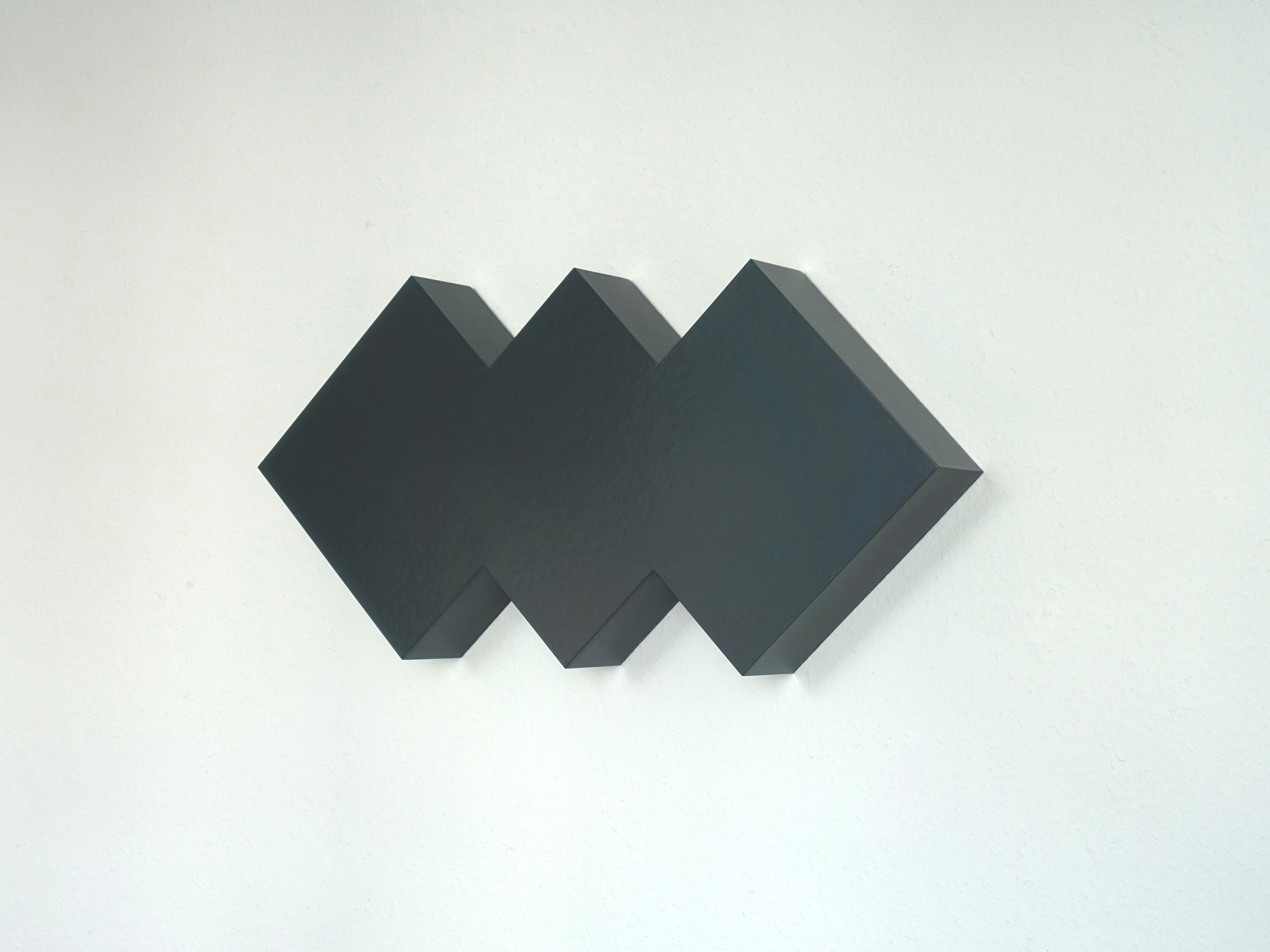 Overlapping black triangles