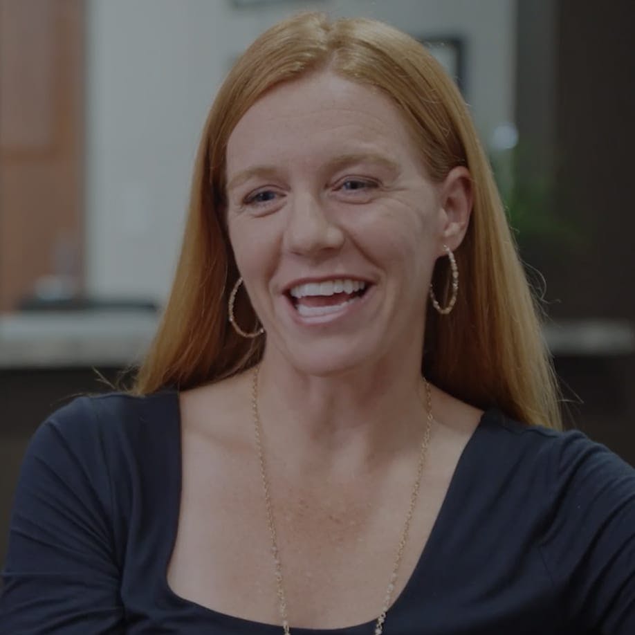 Smiling patient of Dr. Gigena's giving her testimonial.