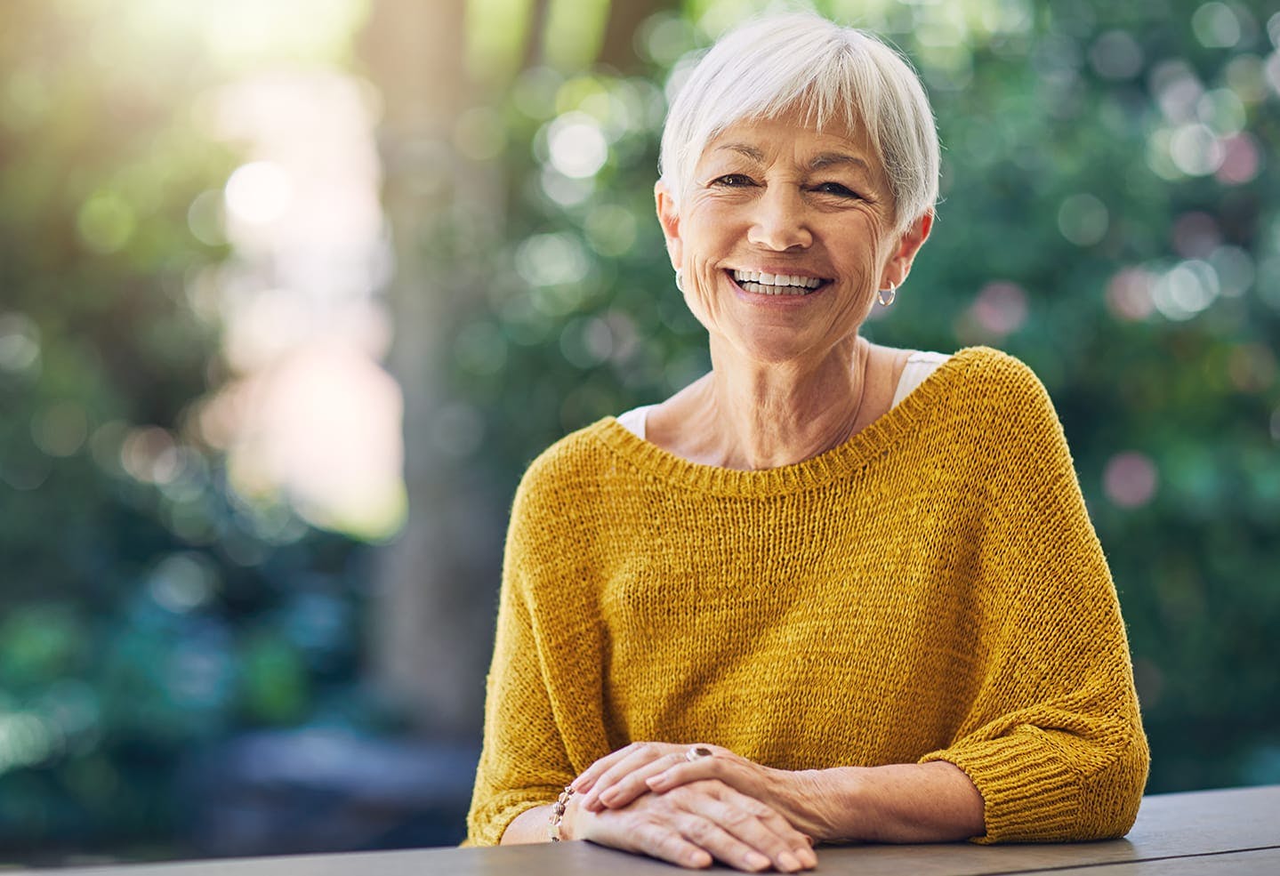 Woman in a yellow sweater
