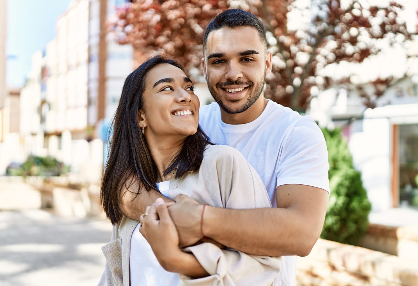 Man hugging a woman
