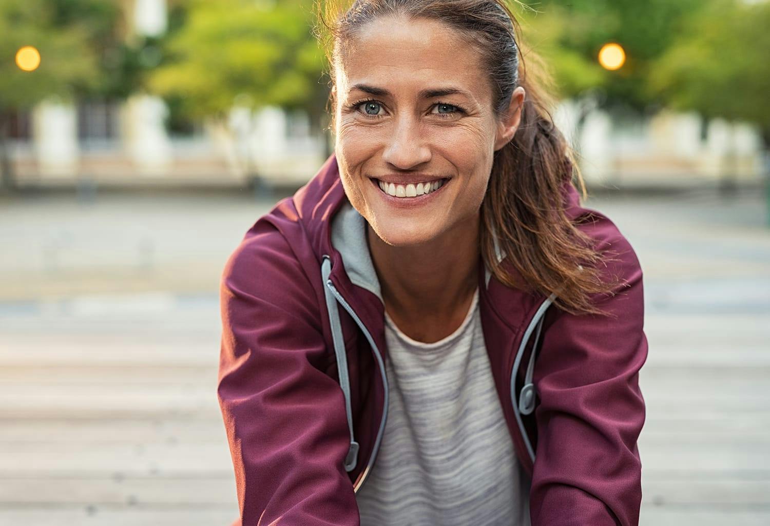 Woman in a burgundy jacket