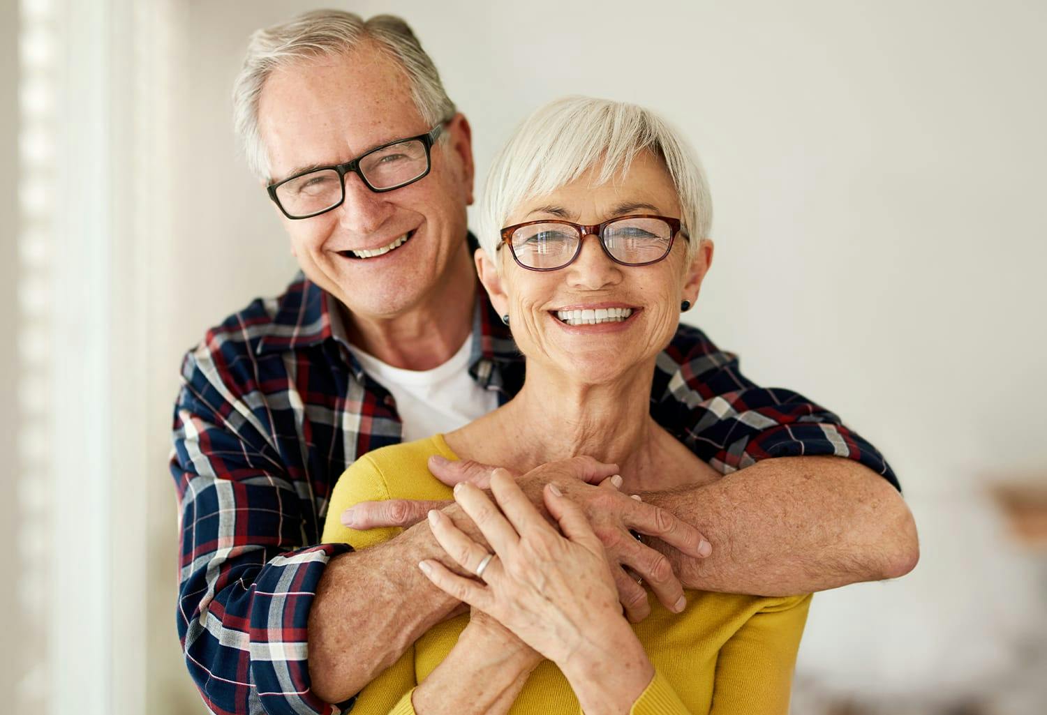 Man hugging a woman