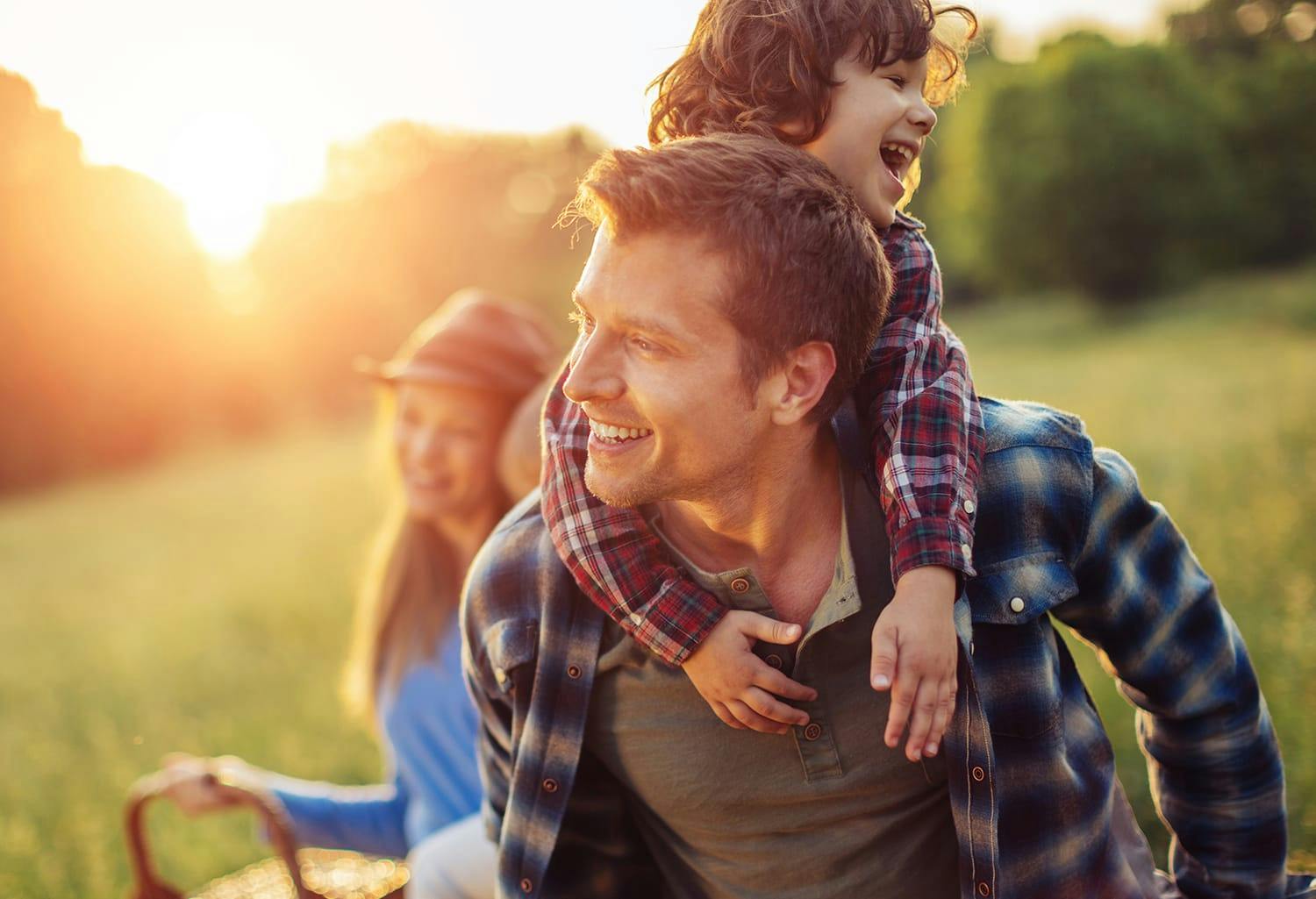 Family outside in a field