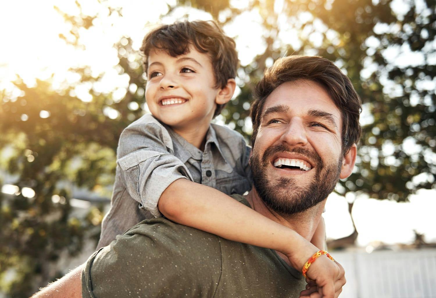 Man with his son on his back