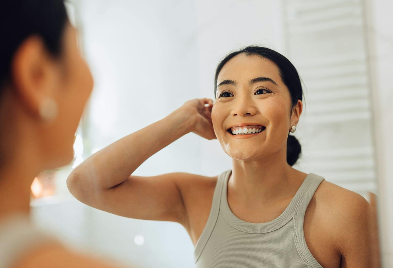 Woman looking in the mirror