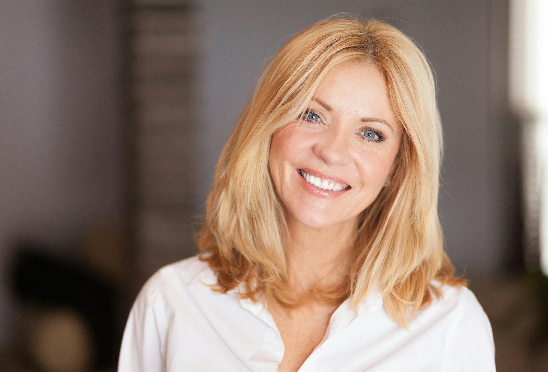 woman with blonde hair smiling