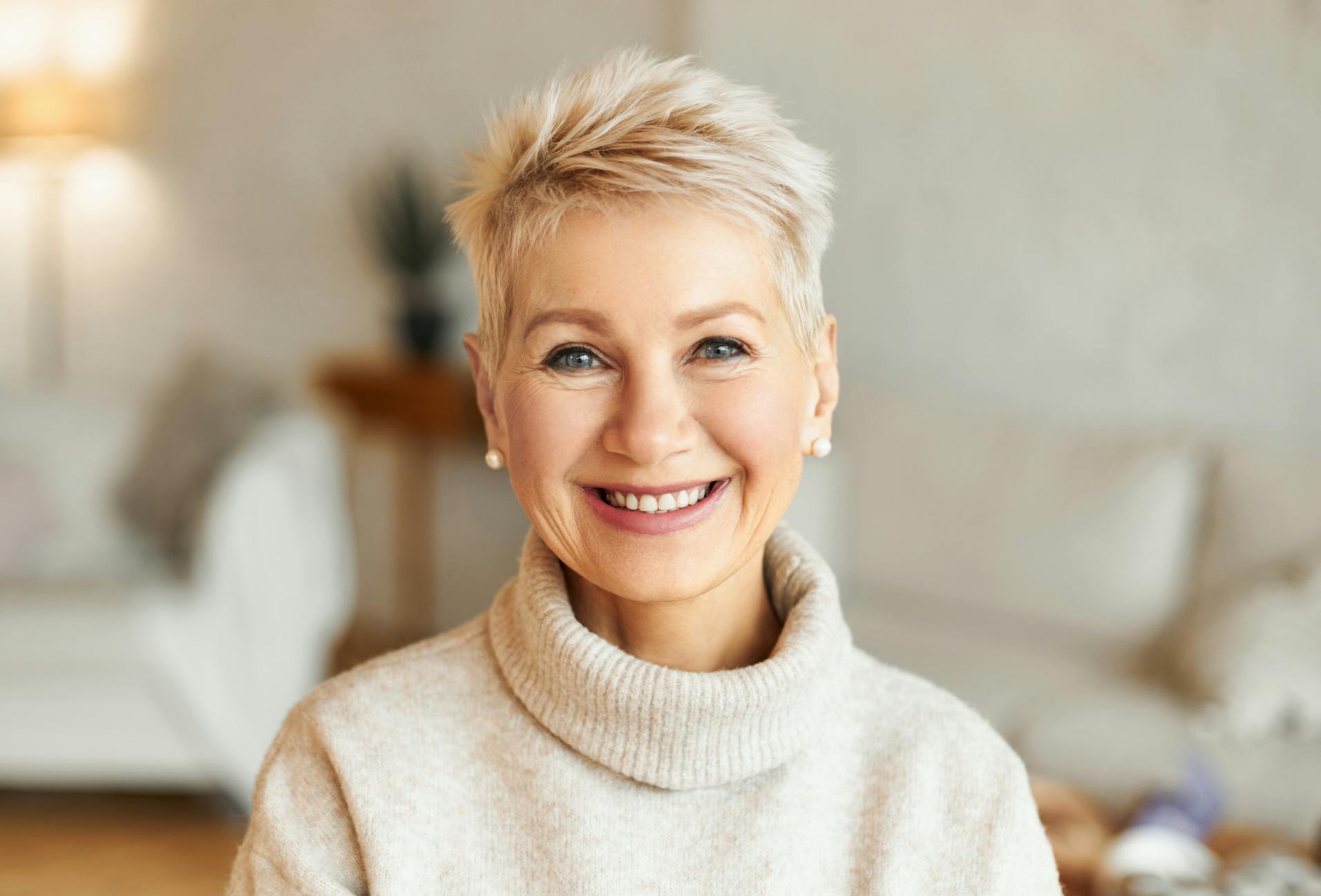 woman with short hair wearing a turtleneck