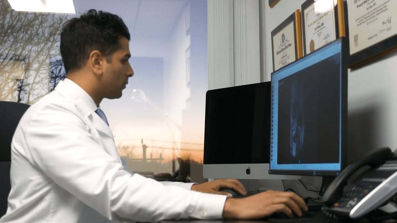 Dr. Tanna on the Computer