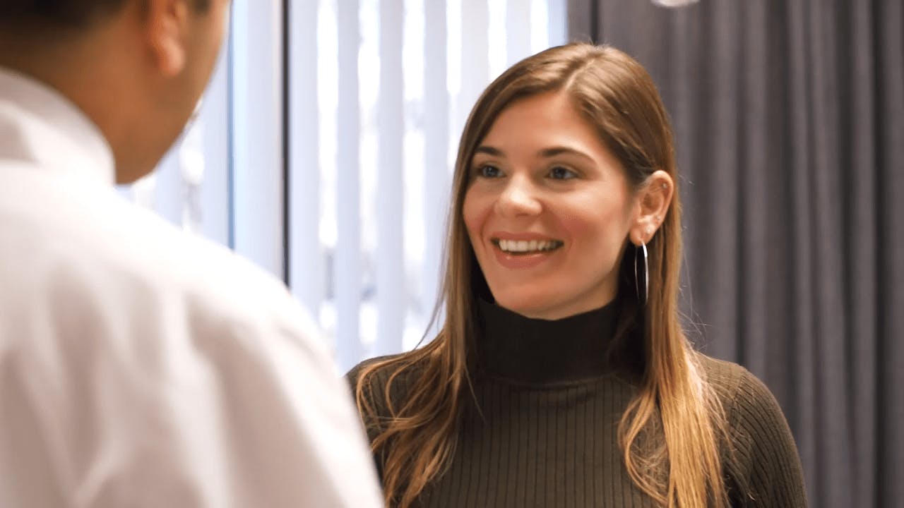 Doctor consulting patient about breast augmentation surgery