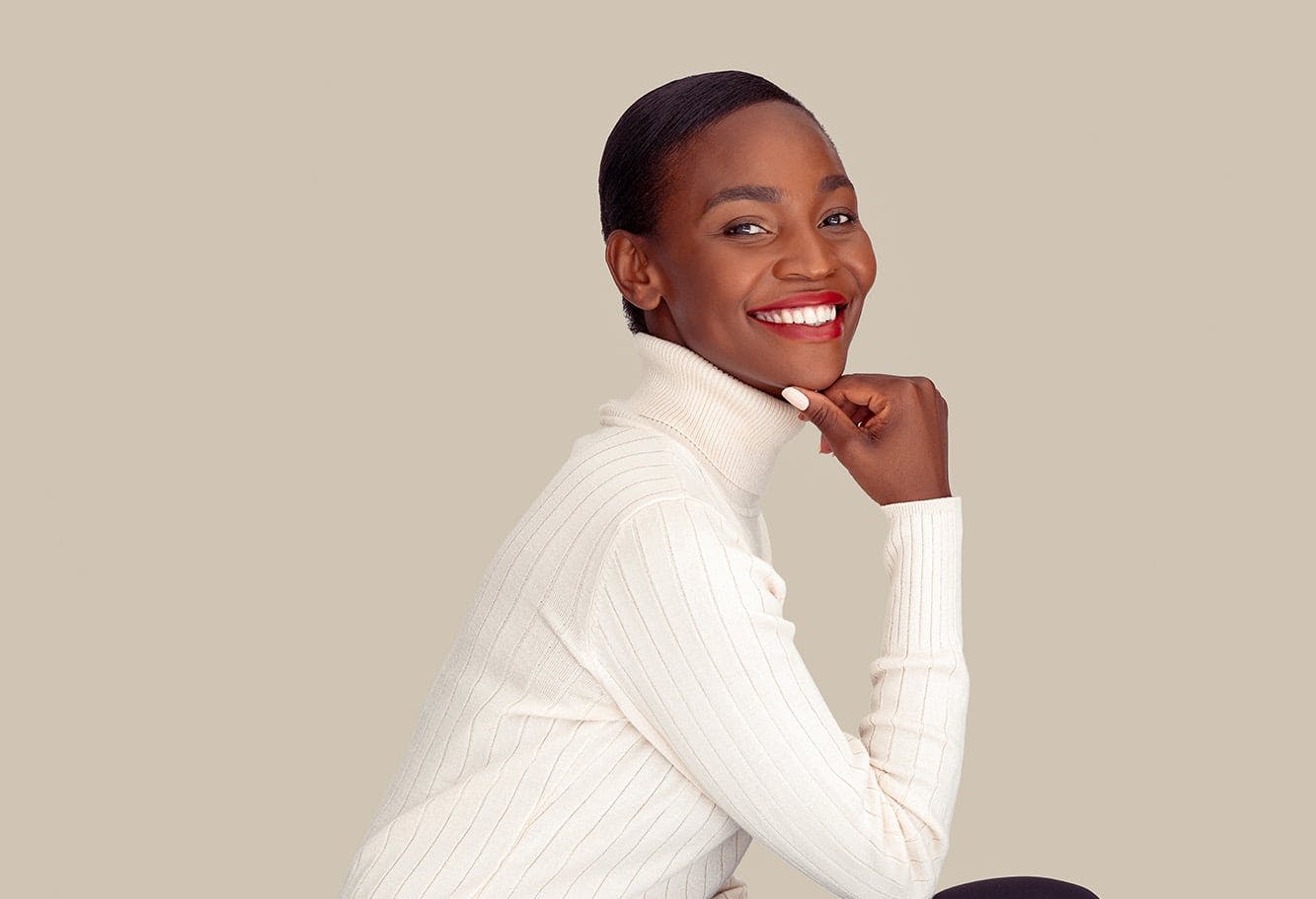 Beautiful Black Woman Posing with a White Shirt
