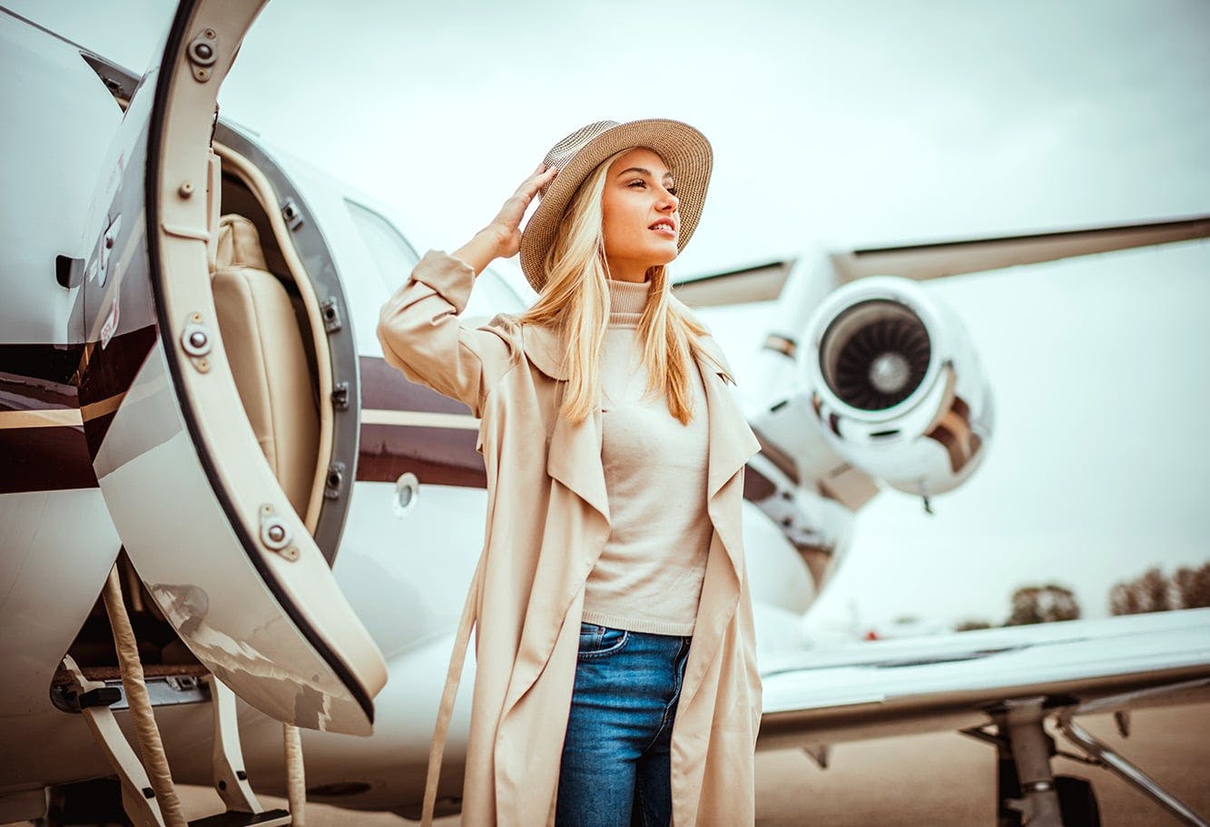 Woman Coming Off of an Airplane