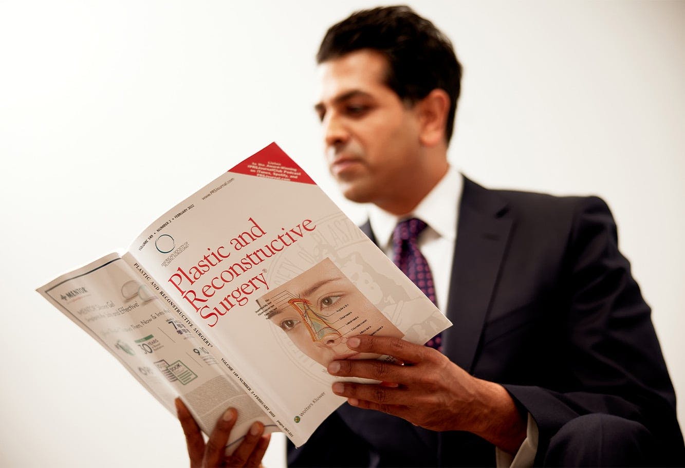 Dr. Tanna Reading a Book
