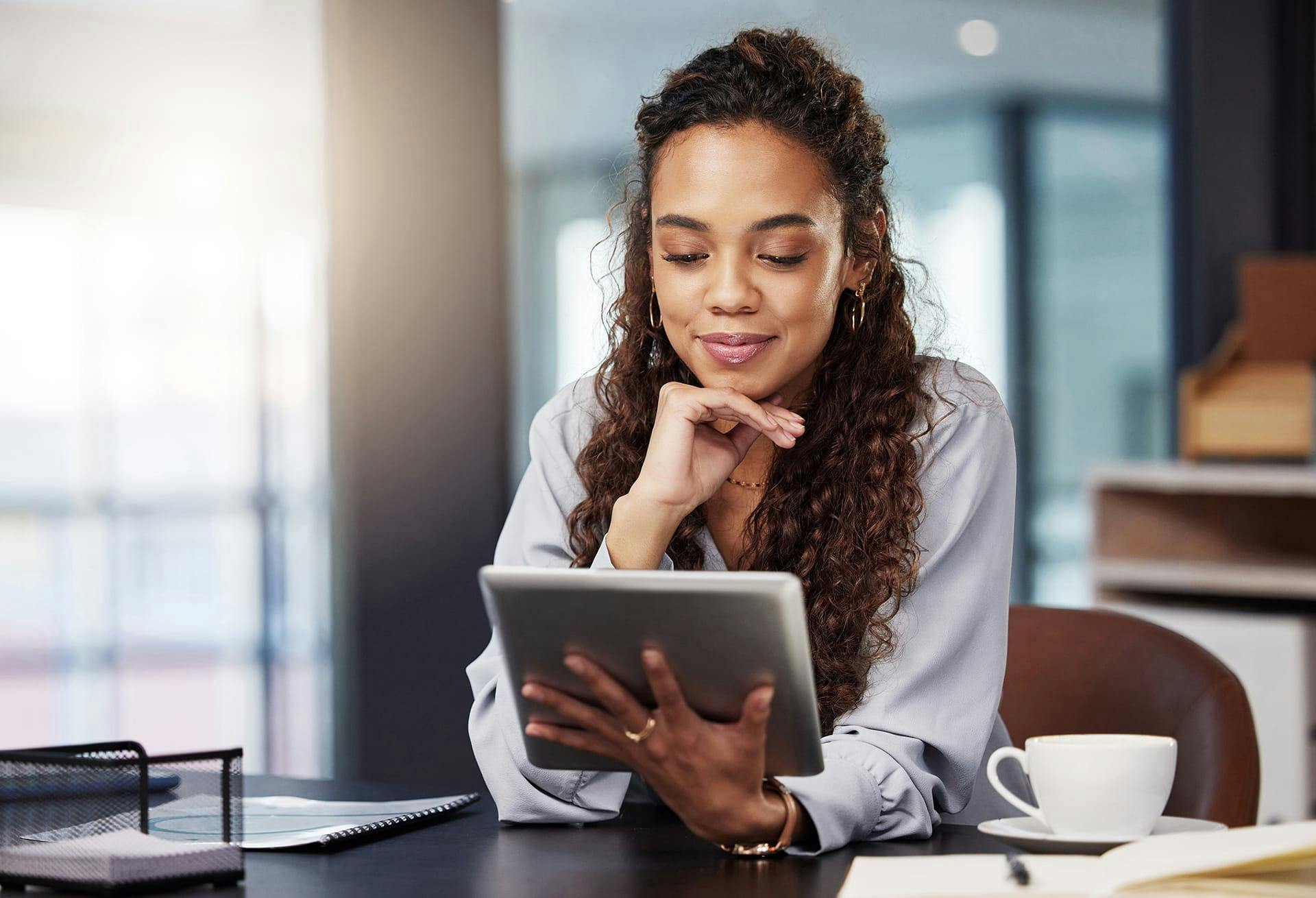 Woman Looking at Her Ipad