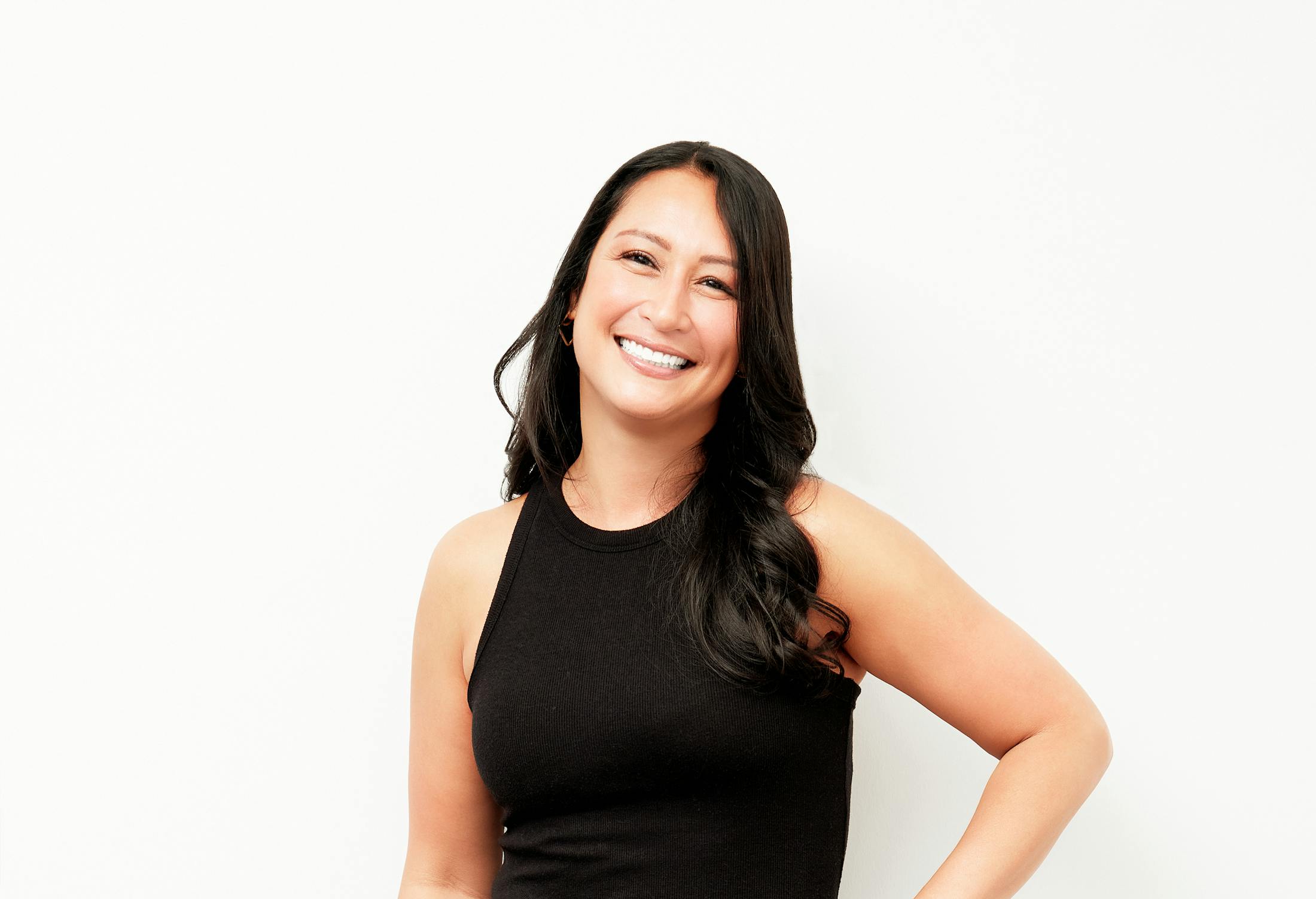 smiling woman in black top