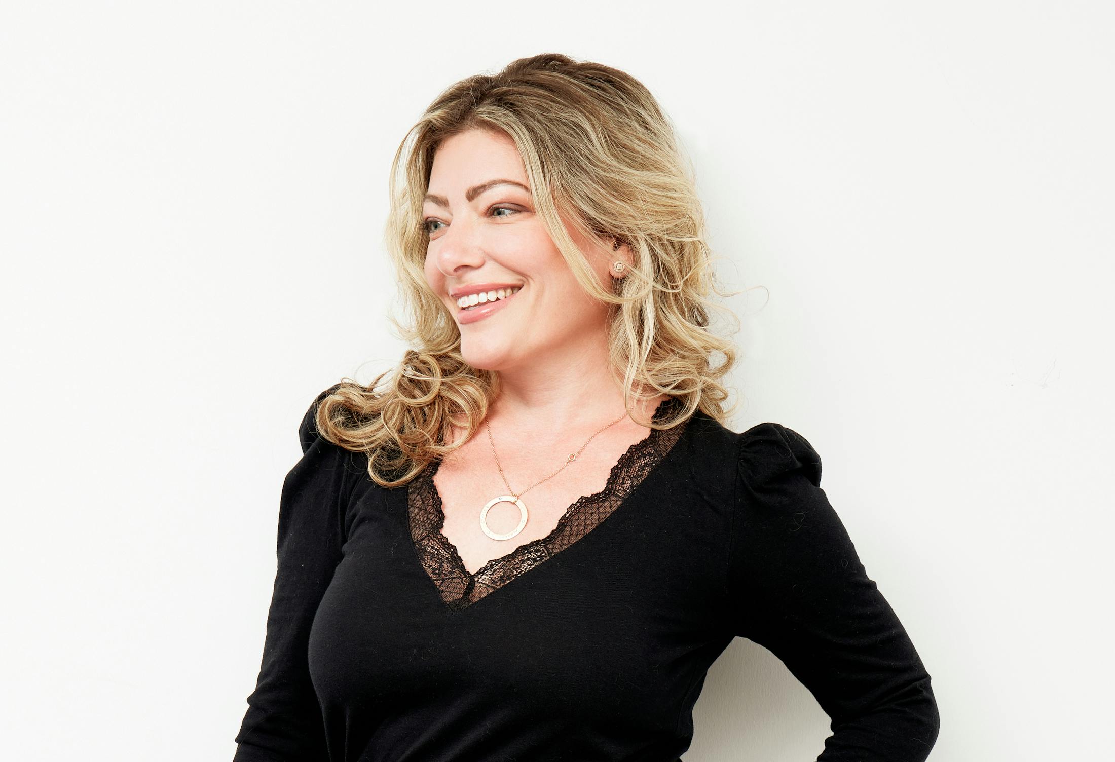 Woman with Blonde Hair Smiling