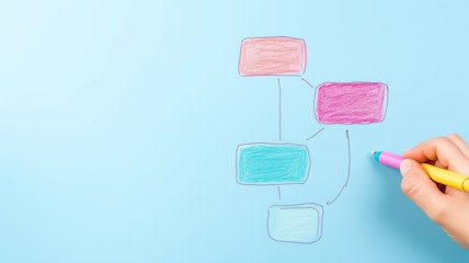 Hand Drawing Flowchart with Colorful Markers on Light Blue Background
