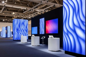 Tech exhibition booth showcasing vibrant LED displays