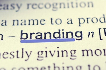 close up shot of word branding in dictionary