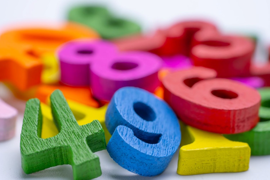 numbers in different colours on white background