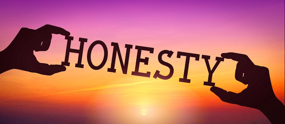 Human Hands Holding Black Silhouette Word