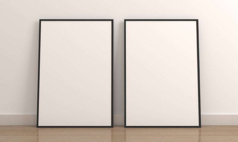 Two vertical empty photo frame mockup on wooden