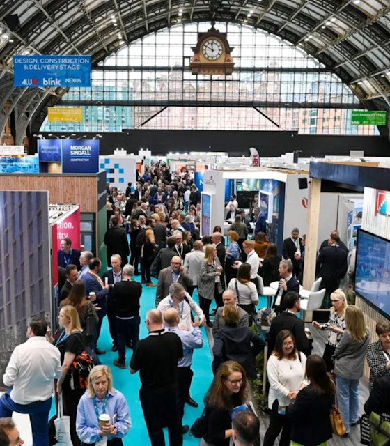 An exhibition corridor of people at The Education Estate Expo.