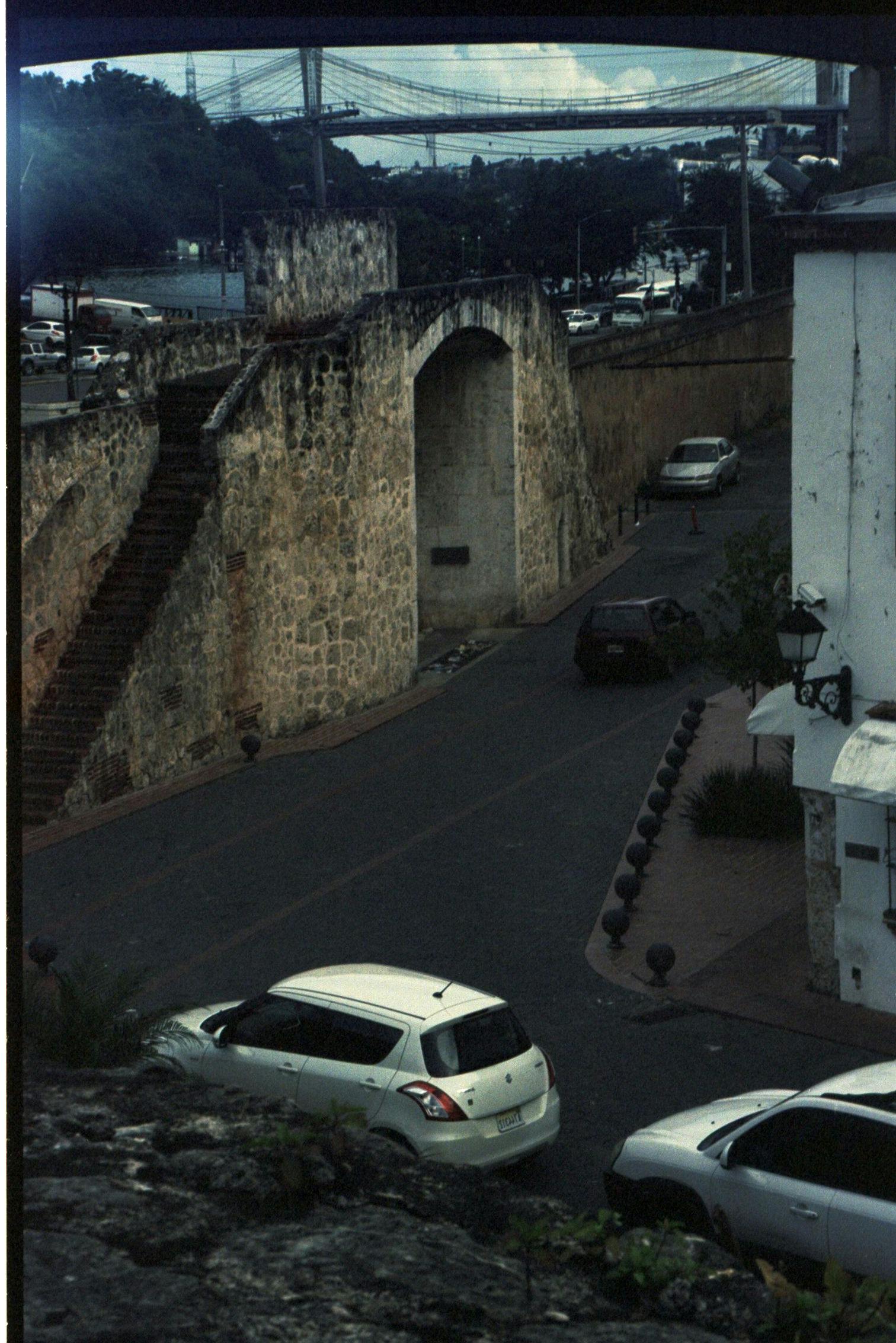 a few cars by the paso colonial