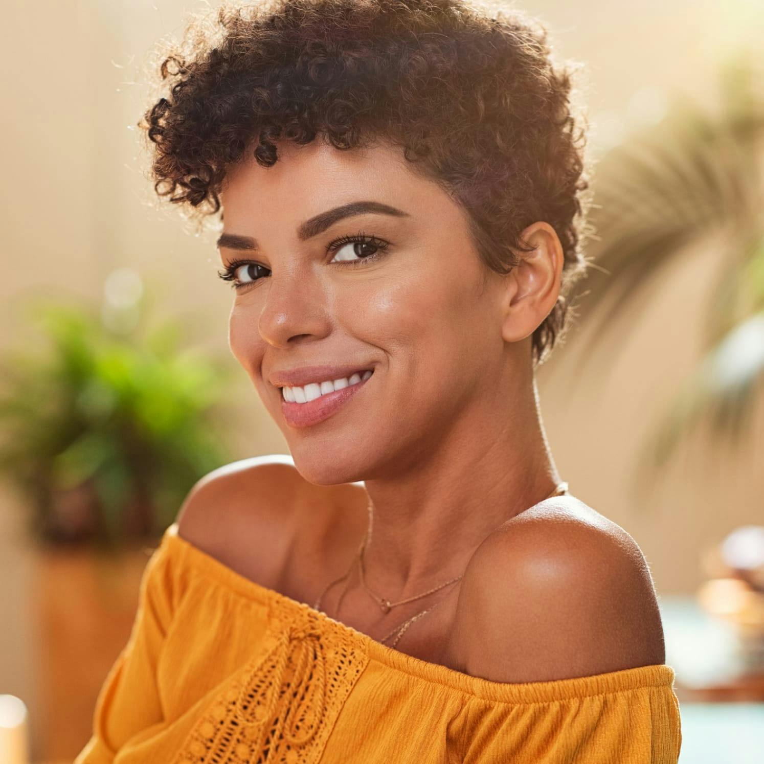 Woman posing with an elegant blouse.