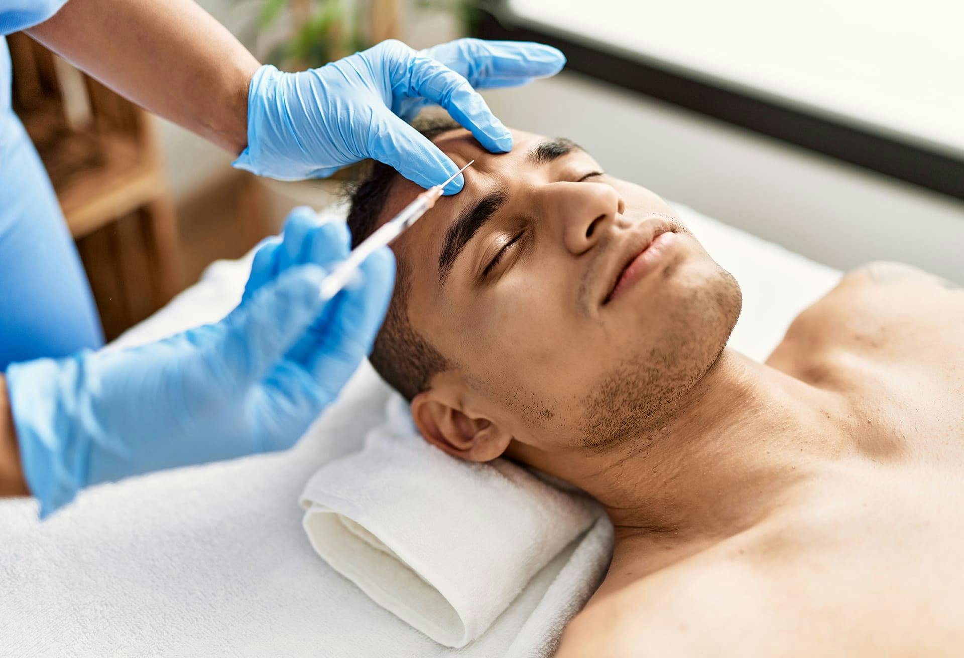 Man getting facial injections