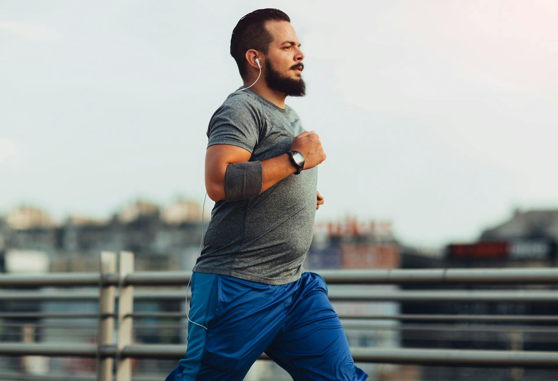 Man running on a bridge