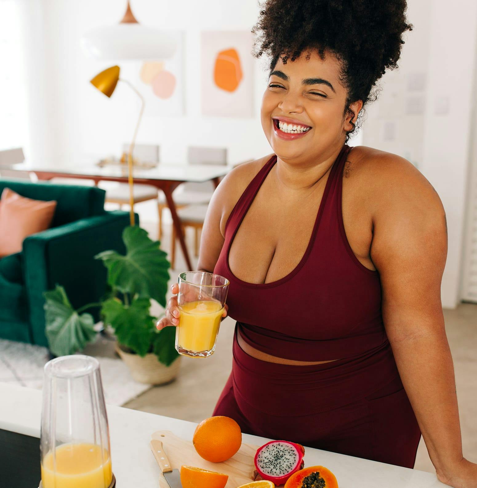 Woman drinking juice she just pressed