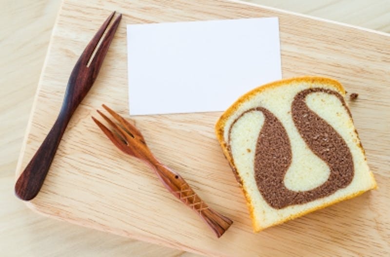 there is a piece of bread with a swirl on it and a fork