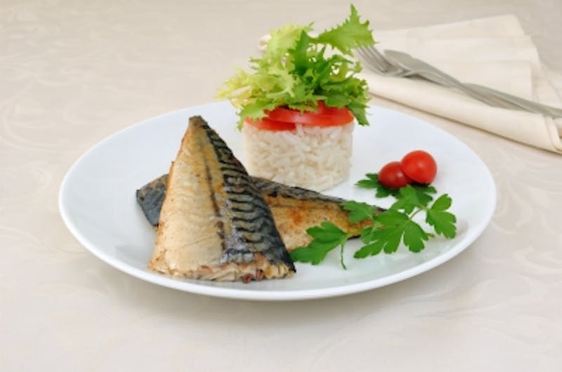 there is a plate of food with fish and rice on it