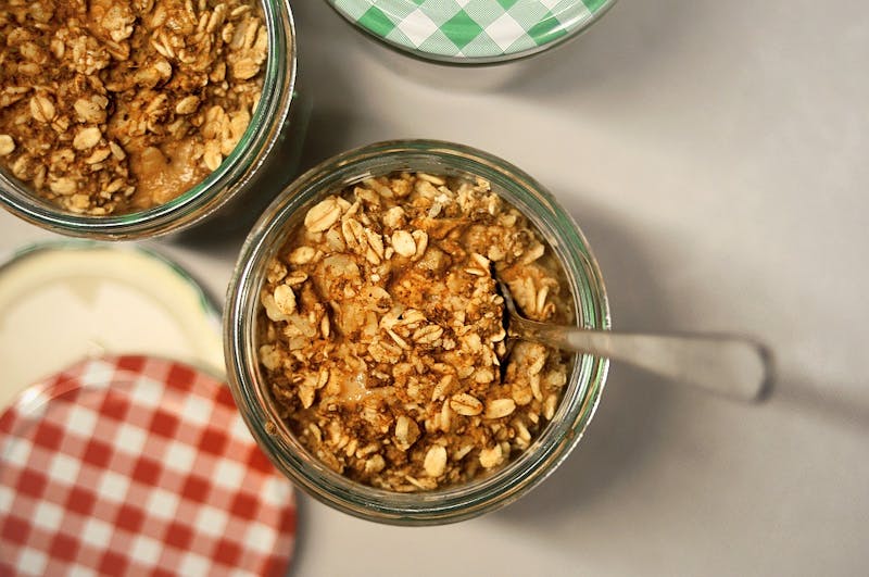there are two bowls of granola sitting on a table