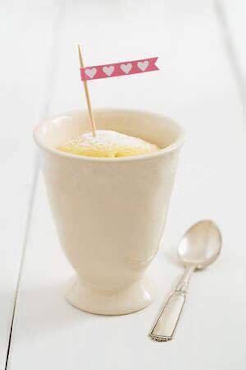 there is a cup of ice cream with a flag in it