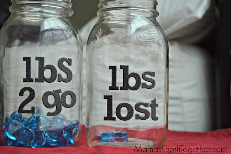 there are two jars with blue stones in them