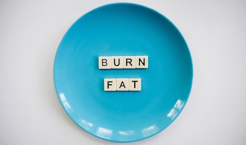 burn fat in scrabble letters on plate