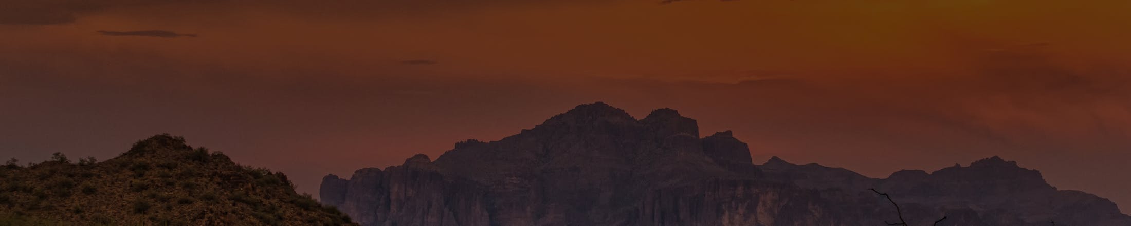 gallery background banner with sunset and mountain