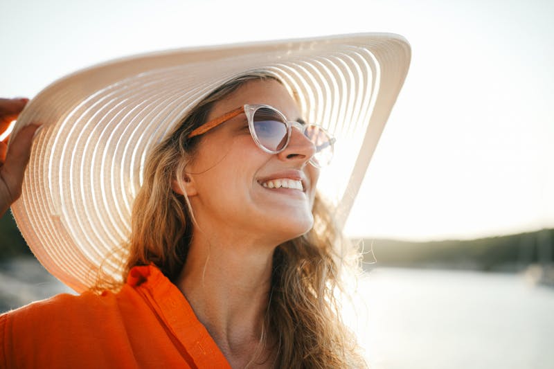 woman smiling in the sun