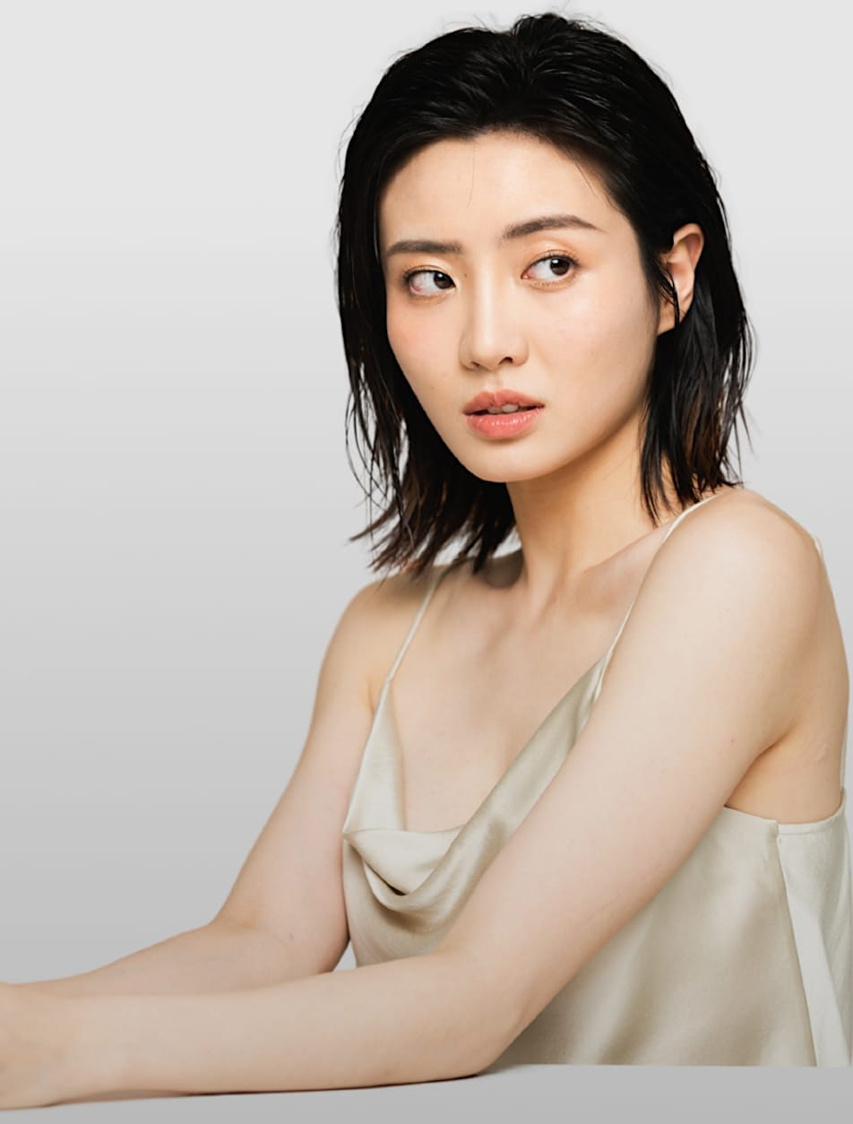 Beautiful woman in silver top