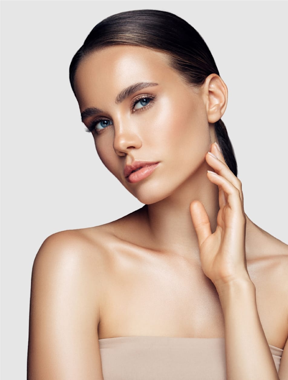 Image of a beautiful woman touching her neck